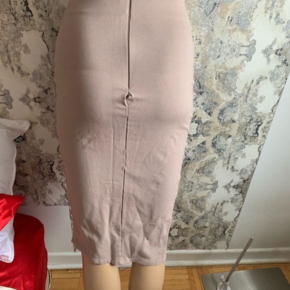 TAN SKIRT WITH ASYMMETRICAL DETAILING ** small tear in back ** - Picture 5 of 7